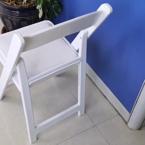 Chaise pliante en plastique blanche chaises de mariage de fête d'hôtel se pliantes en résine extérieure
